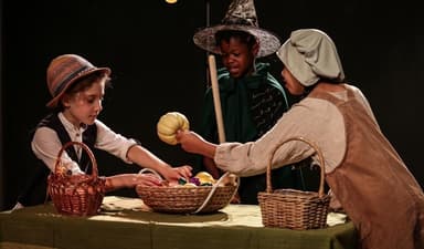 Performers from The Little Choir Of Joy acting in Hansel & Gretel